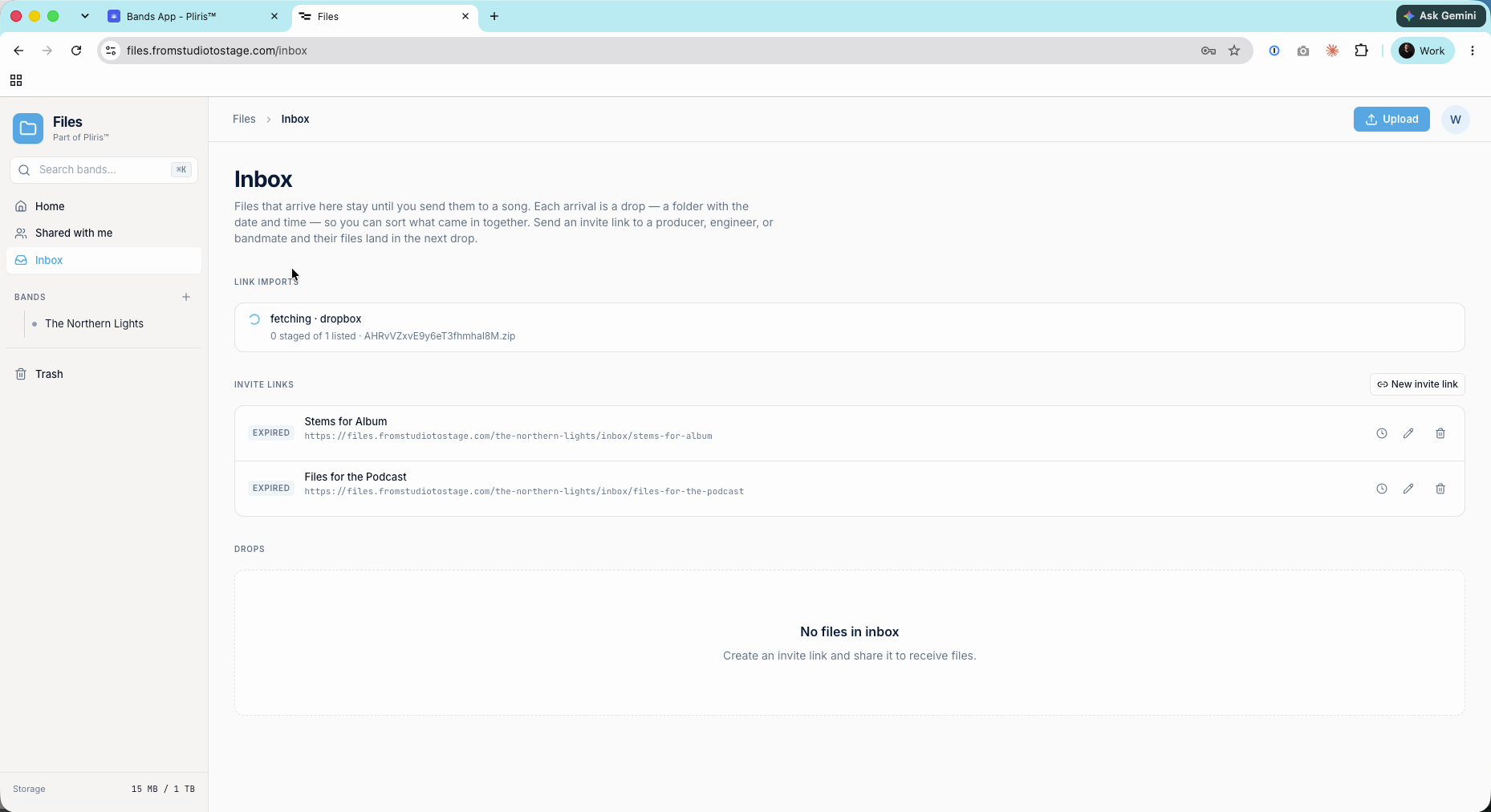 The Inbox while an import is fetching from Dropbox.