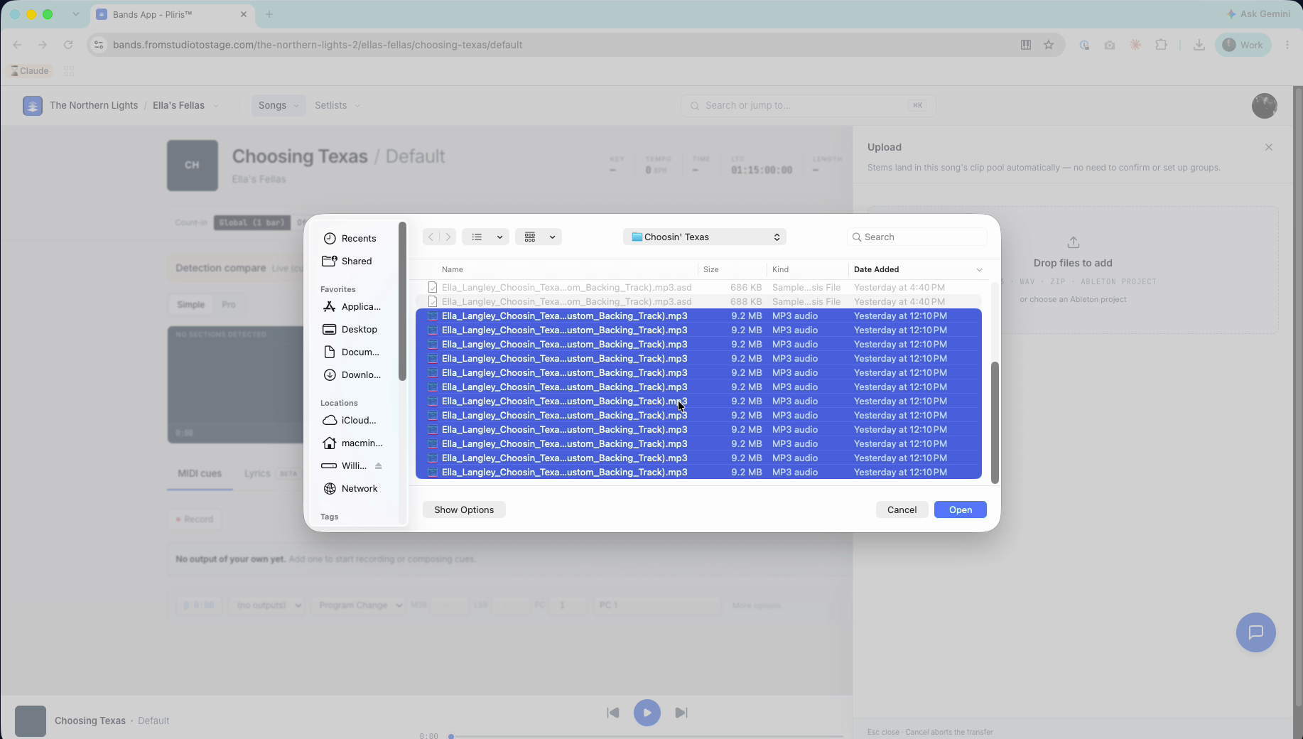 The macOS file chooser with all of the song's stems selected.